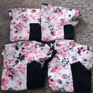 Cherokee pink and black floral scrub tops.